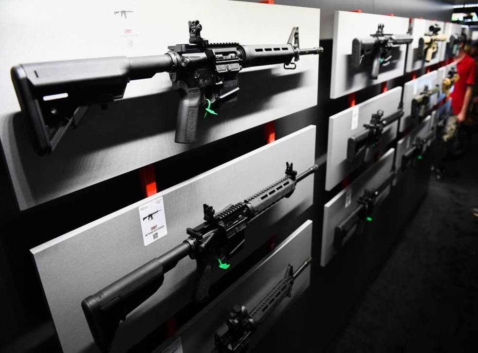<p>AR-15-style rifles on display</p>