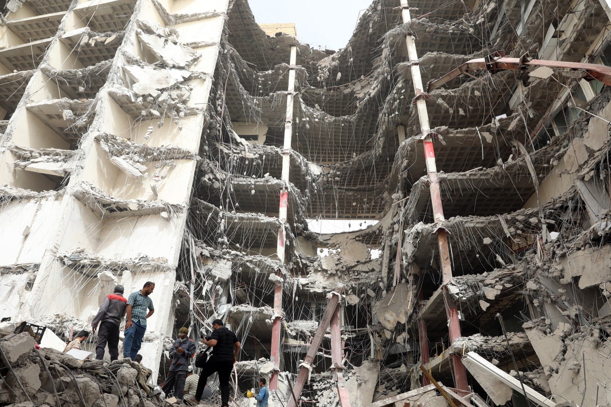 ‘Abadan is heartbroken’: Grieving Iran protesters rage against regime after building collapse