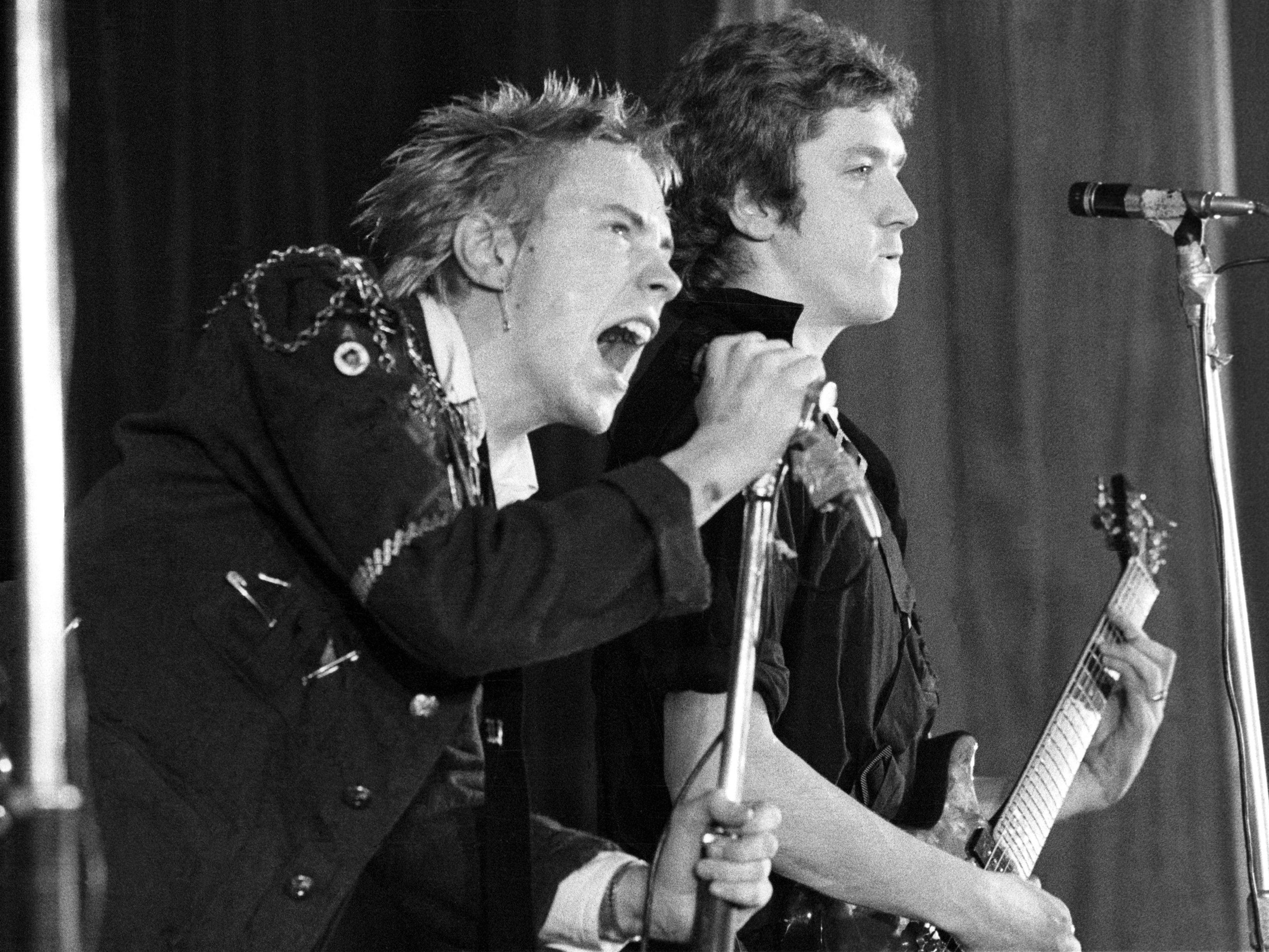 Johnny Rotten (John Lydon) and Steve Jones performing as The Sex Pistols in 1976