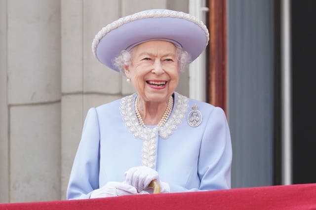 <p>Queen Elizabeth II watches from the balcony during the Trooping the Colour ceremony</p>