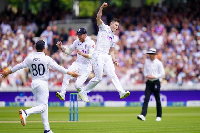 Matthew Potts, right, and Ben Stokes, centre, celebrate the wicket of New Zealand captain Kane Williamson (Adam Davy/PA)
