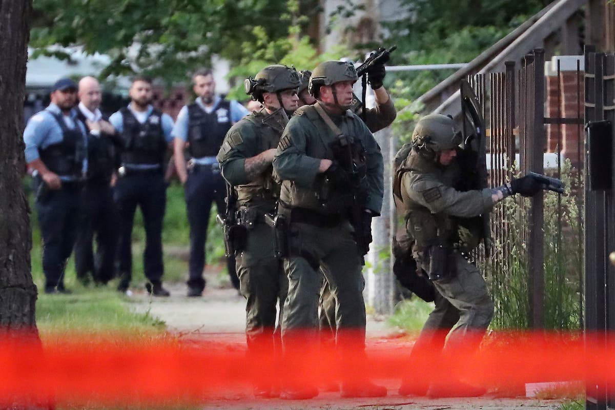 Chicago officer critically hurt when shots fired into car