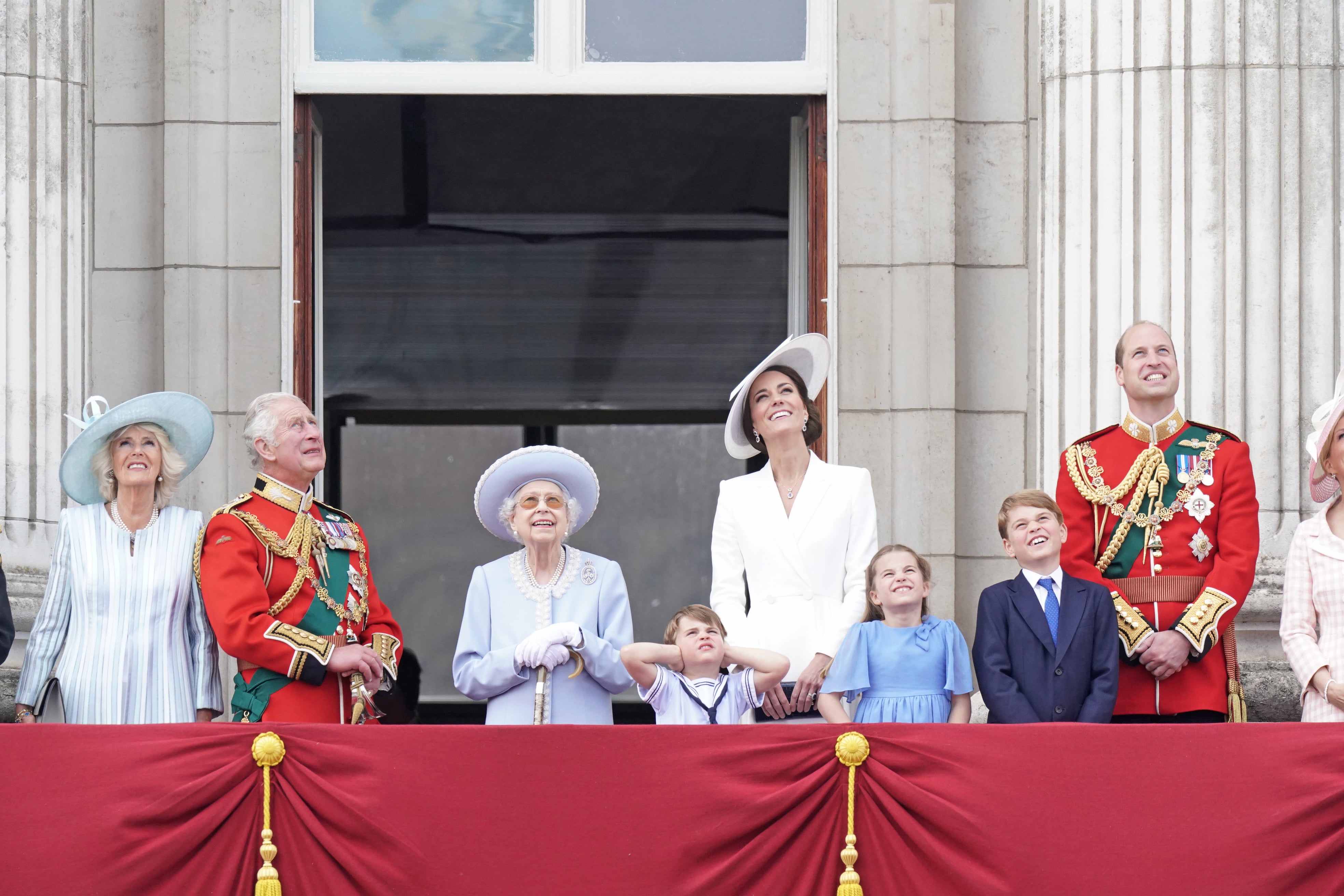 The Duchess of Cornwall, the Prince of Wales , Queen Elizabeth II , the Duchess of Cambridge, Prince Louis, the Duchess of Cambridge, Princess Charlotte, Prince George, and the Duke of Cambridge, on the balcony of Buckingham Palace, to view the Platinum Jubilee flypast (Aaron Chown/PA)