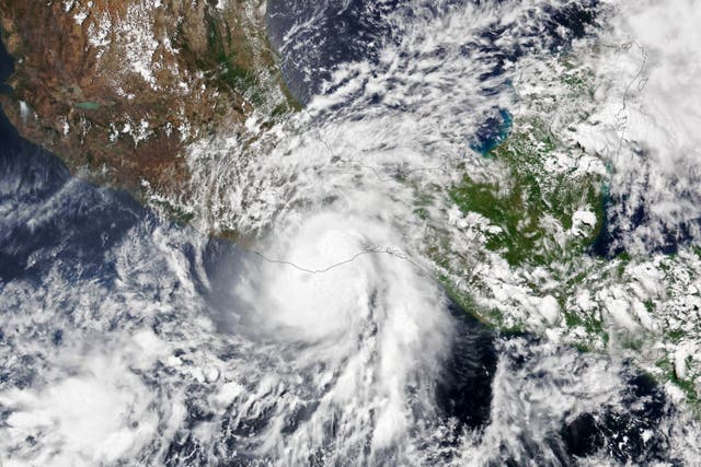 <p>Satellite footage of Hurricane Agatha hitting Mexico on Tuesday. The storm could reform into Alex over the Caribbean and Gulf of Mexico</p>