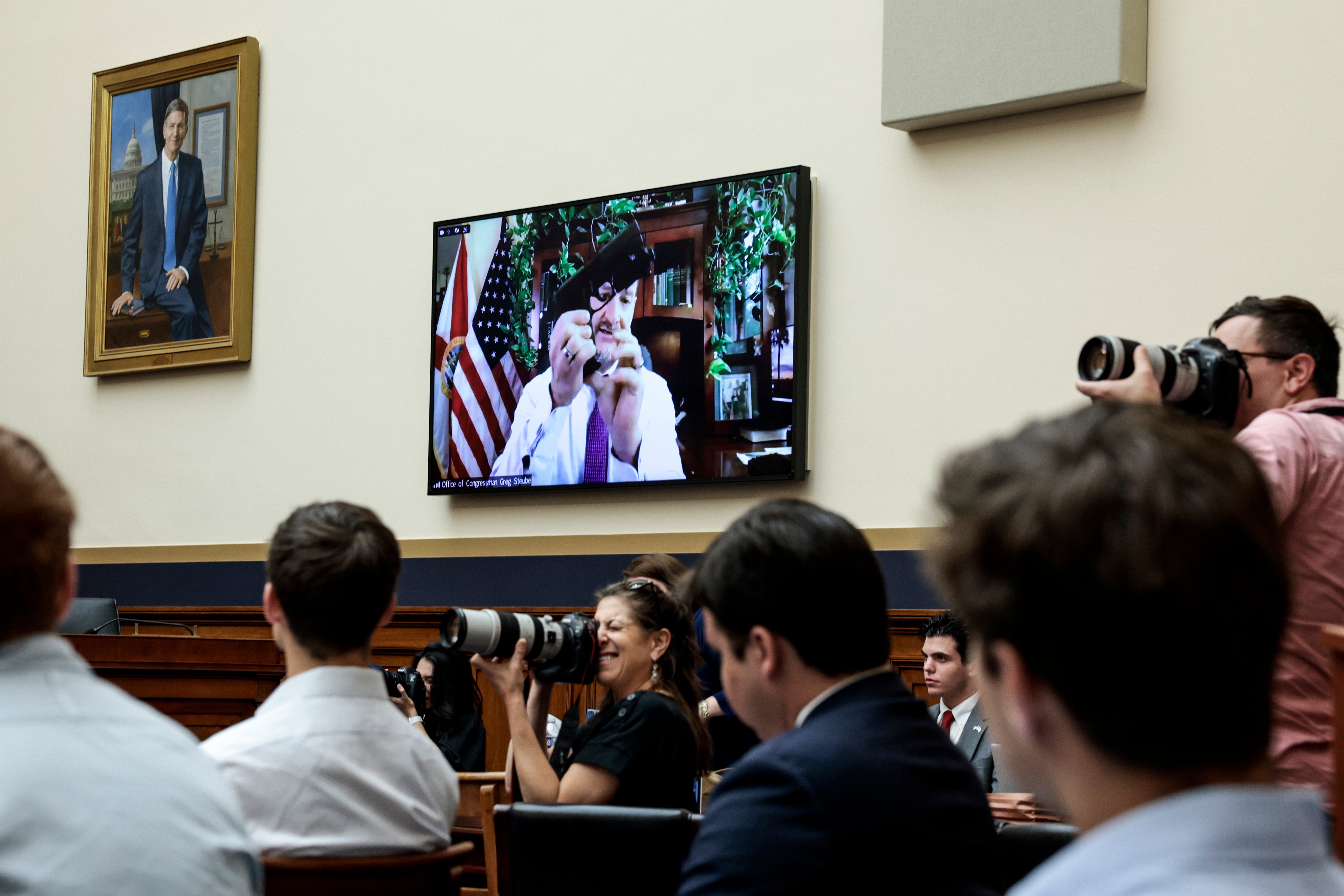 Rep. Greg Steube (R-FL) demonstrates assembling his handgun as he speaks remotely during during a House Judiciary Committee mark up hearing in the Rayburn House Office Building on June 02, 2022 in Washington, DC