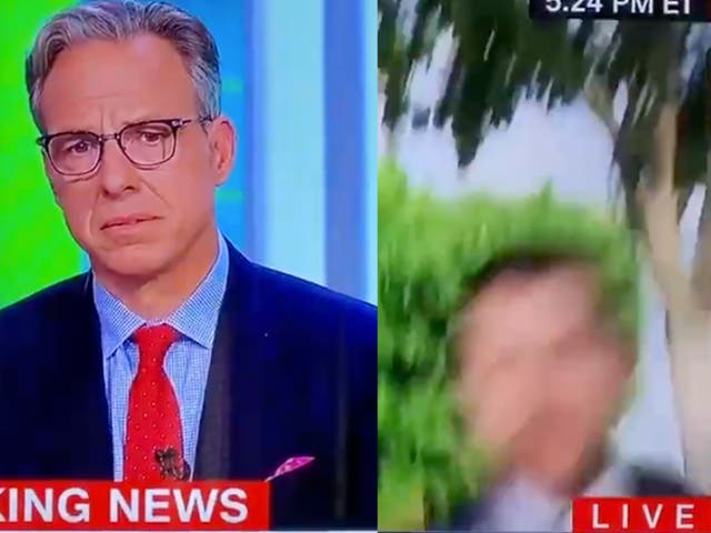 <p>CNN host Jake Tapper watches as a camera collapses during an interview with the White House director of the National Economic Council Brian Deese. </p>