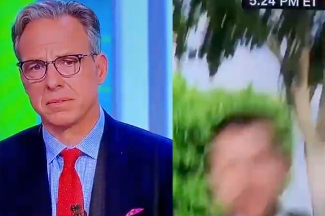 <p>CNN host Jake Tapper watches as a camera collapses during an interview with the White House director of the National Economic Council Brian Deese. </p>