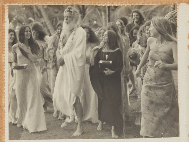 <p>Father Yod with Isis Aquarian, in a photograph featured in ‘The Source Family Scrapbook’ </p>