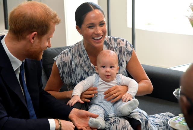 <p>Prince Archie with the Duke and Duchess of Sussex </p>