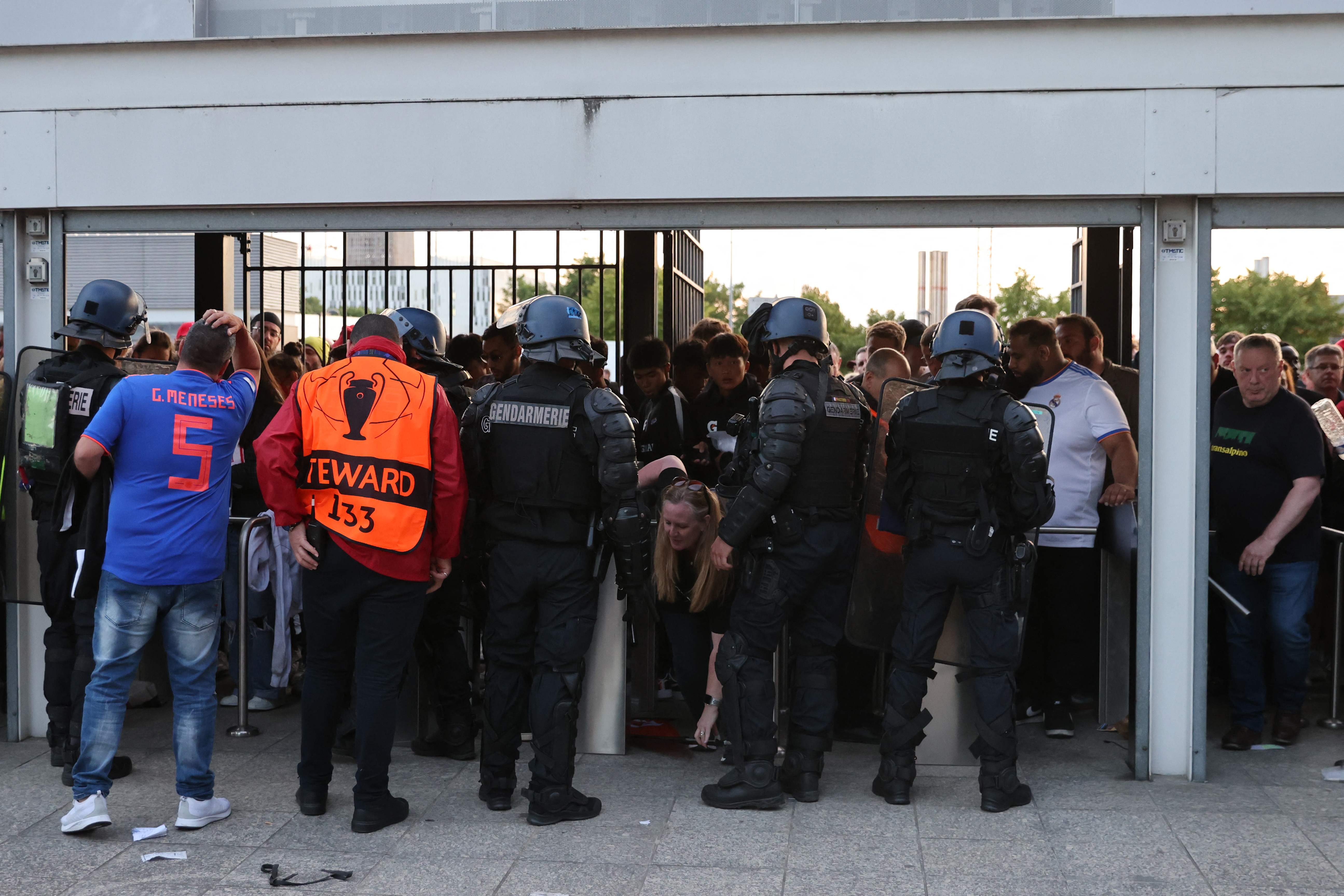 Real Madrid fans attempt to enter the Stade de France