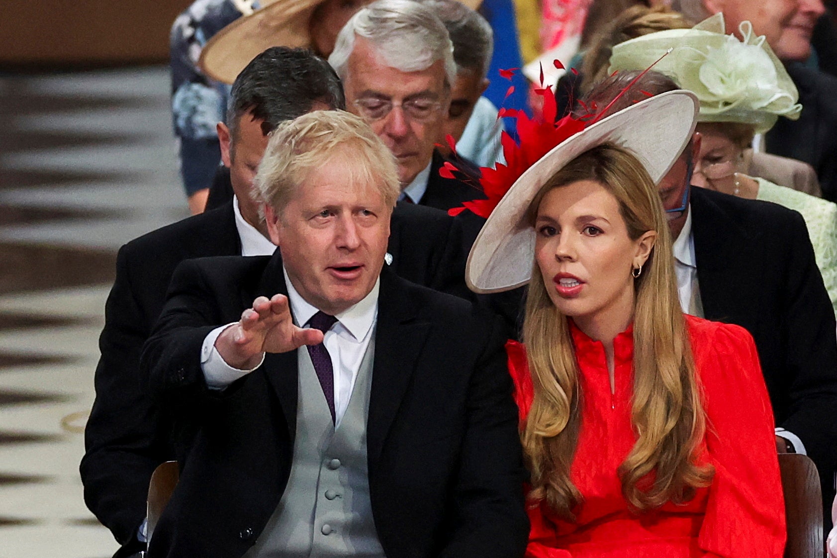 Platinum Jubilee Carrie Johnson wears red fitted dress and matching hat for thanksgiving service The Independent photo