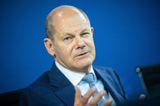 German parliament OKs higher minimum wage pledged by Scholz