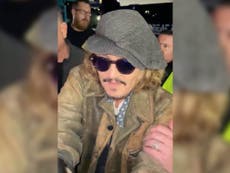 Johnny Depp jokes about severed finger with child outside his latest gig with Jeff Beck