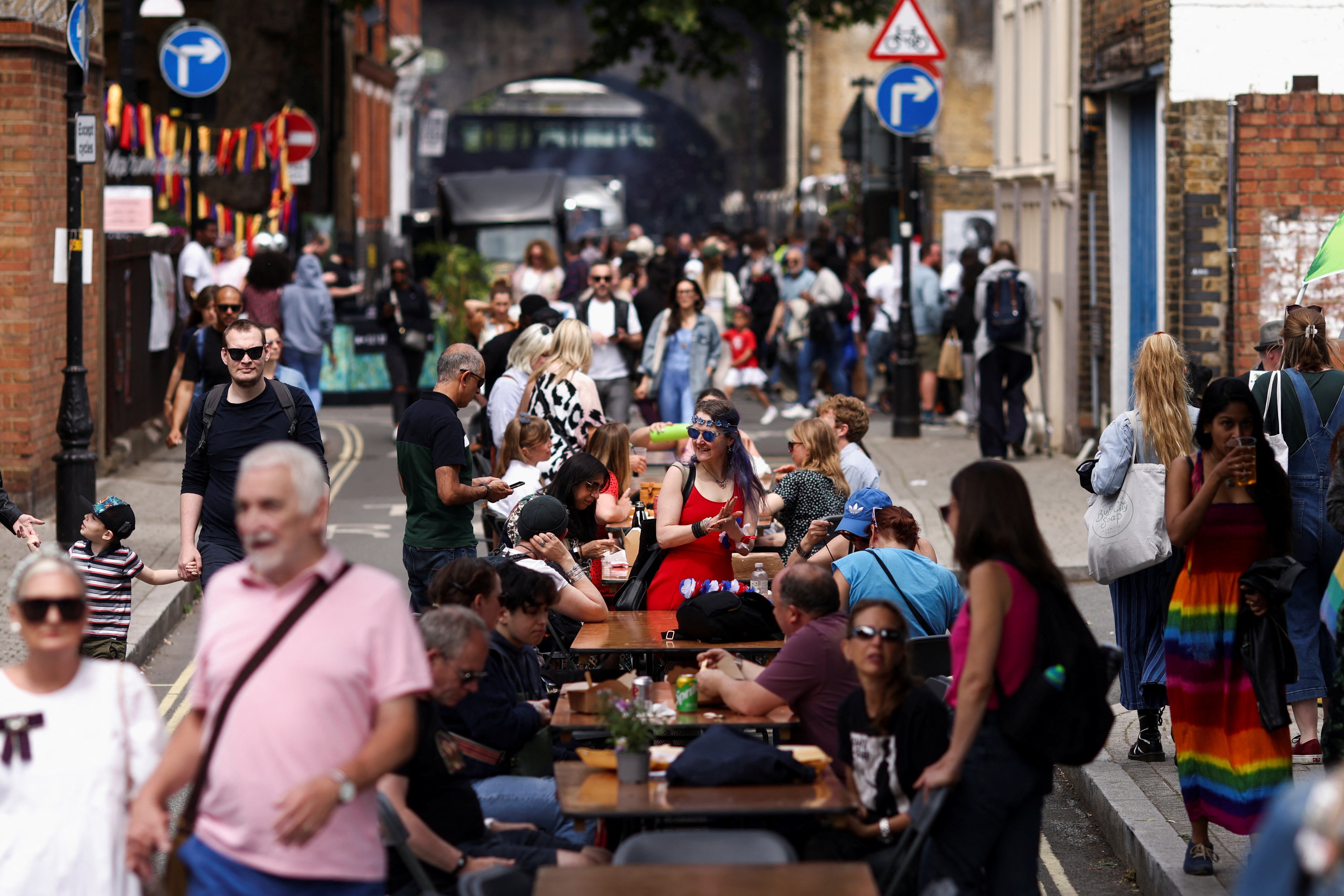 People take part in a community street party in Borough, London