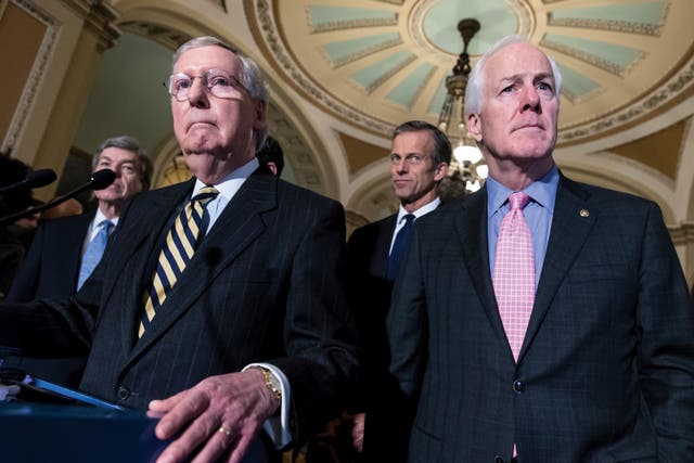 <p>Mitch McConnell, left, and John Cornyn attend a news conference </p>