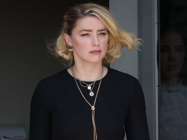 <p>Amber Heard departs the Fairfax County Courthouse on 1 June 2022 in Fairfax, Virginia</p>