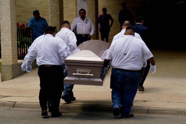 <p>Pallbearers carry the casket of Amerie Jo Garza into Sacred Heart Catholic Church for a funeral service, Tuesday, May 31, 2022, in Uvalde, Texas. </p>