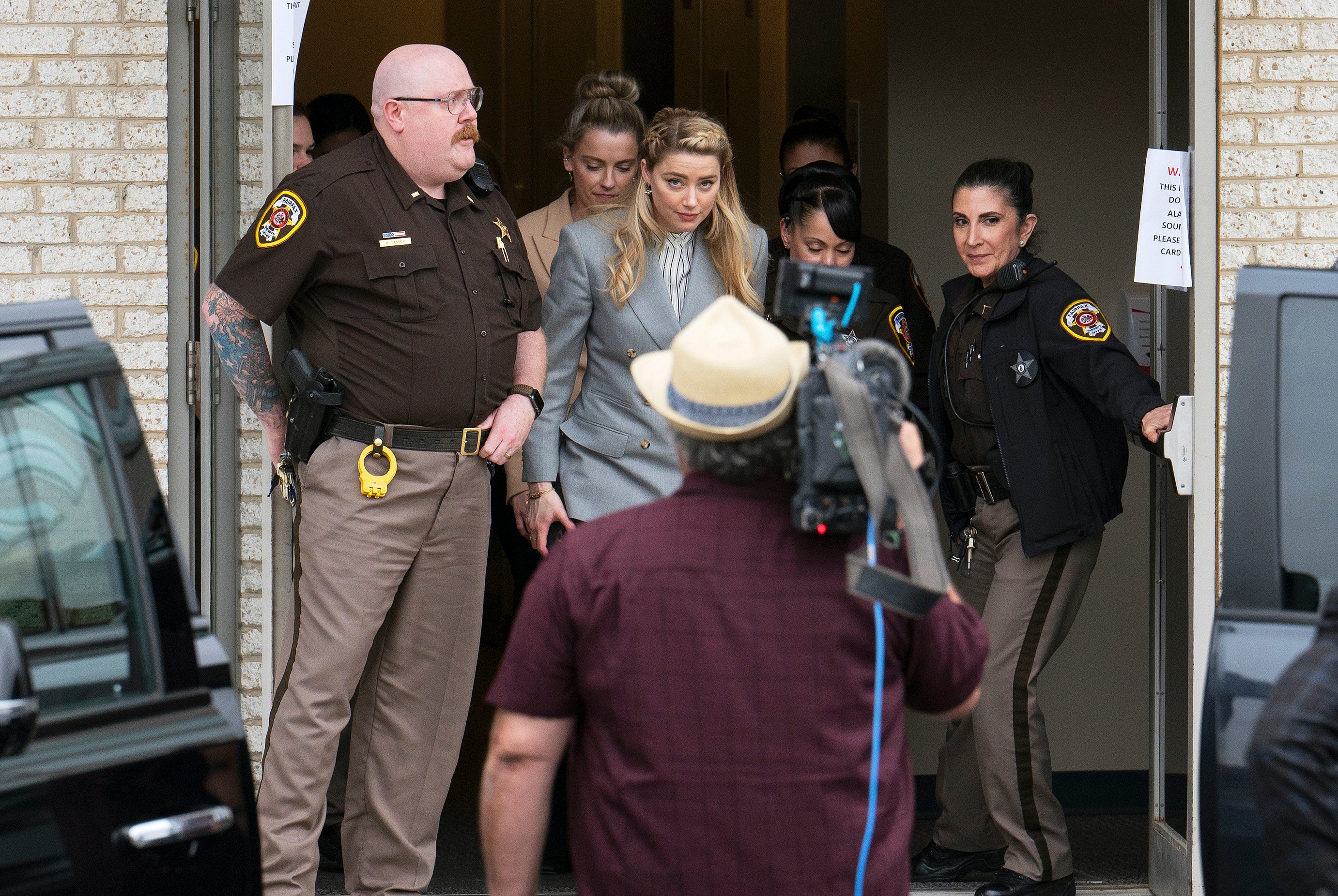 Actress Amber Heard departs the Fairfax County Courthouse Friday, May 27, 2022 in Fairfax, Va