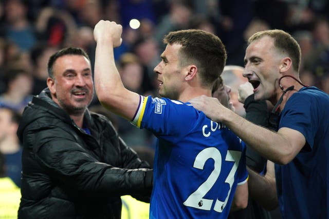 Fans mob Everton’s Seamus Coleman after the club secured their Premier League status (Peter Byrne/PA)