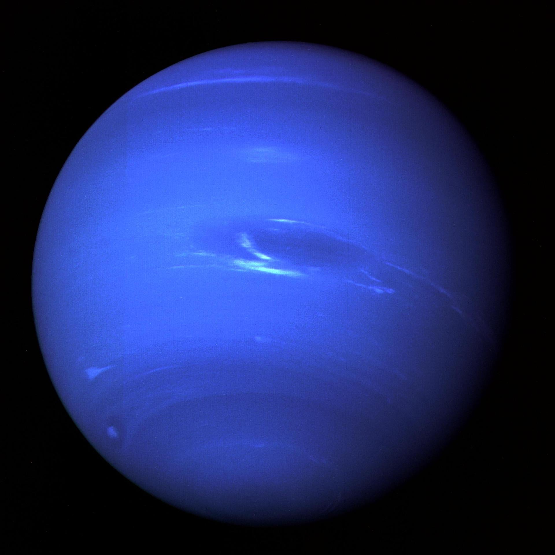 The deep azure atmosphere of Neptune is apparent in this image taken by Voyager 2 in 1989