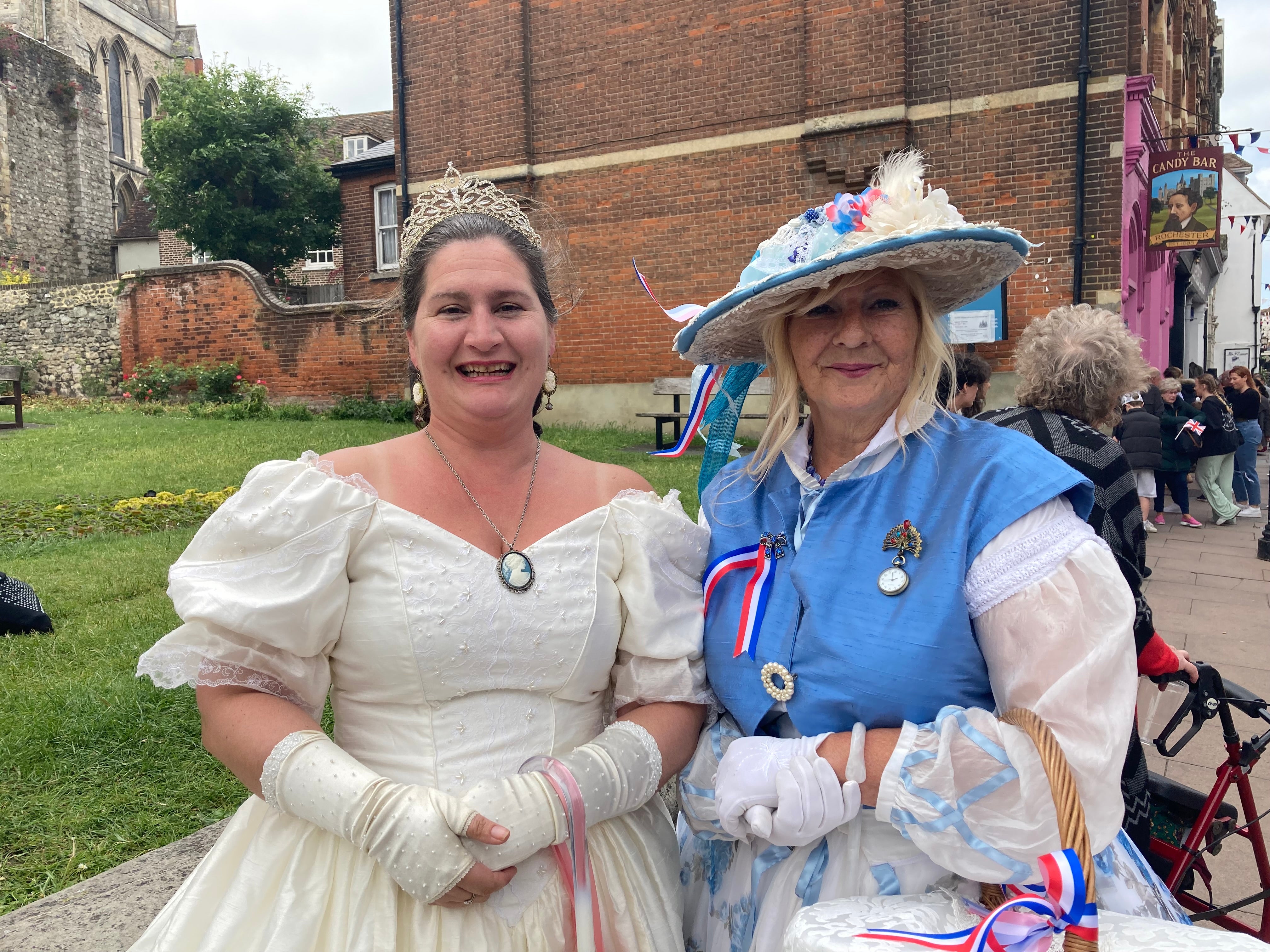 Rebecca Chorley and Sue Smith in Dickensian period dress at the Rochester Dickens Festival marking the Platinum Jubilee on June 4, 2022