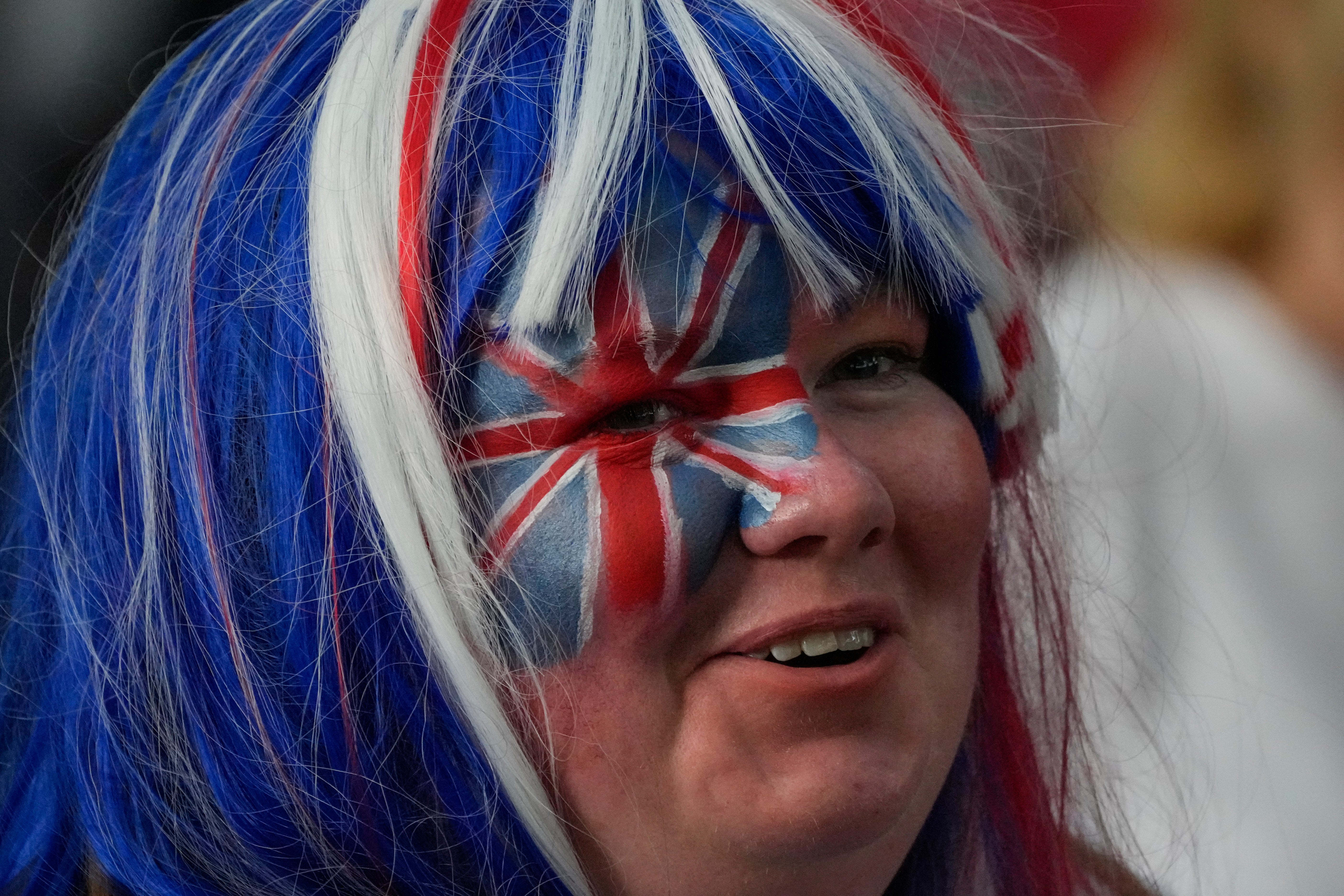 A royal fan with face paint and colored hair is seen prior to the Platinum Jubilee concert