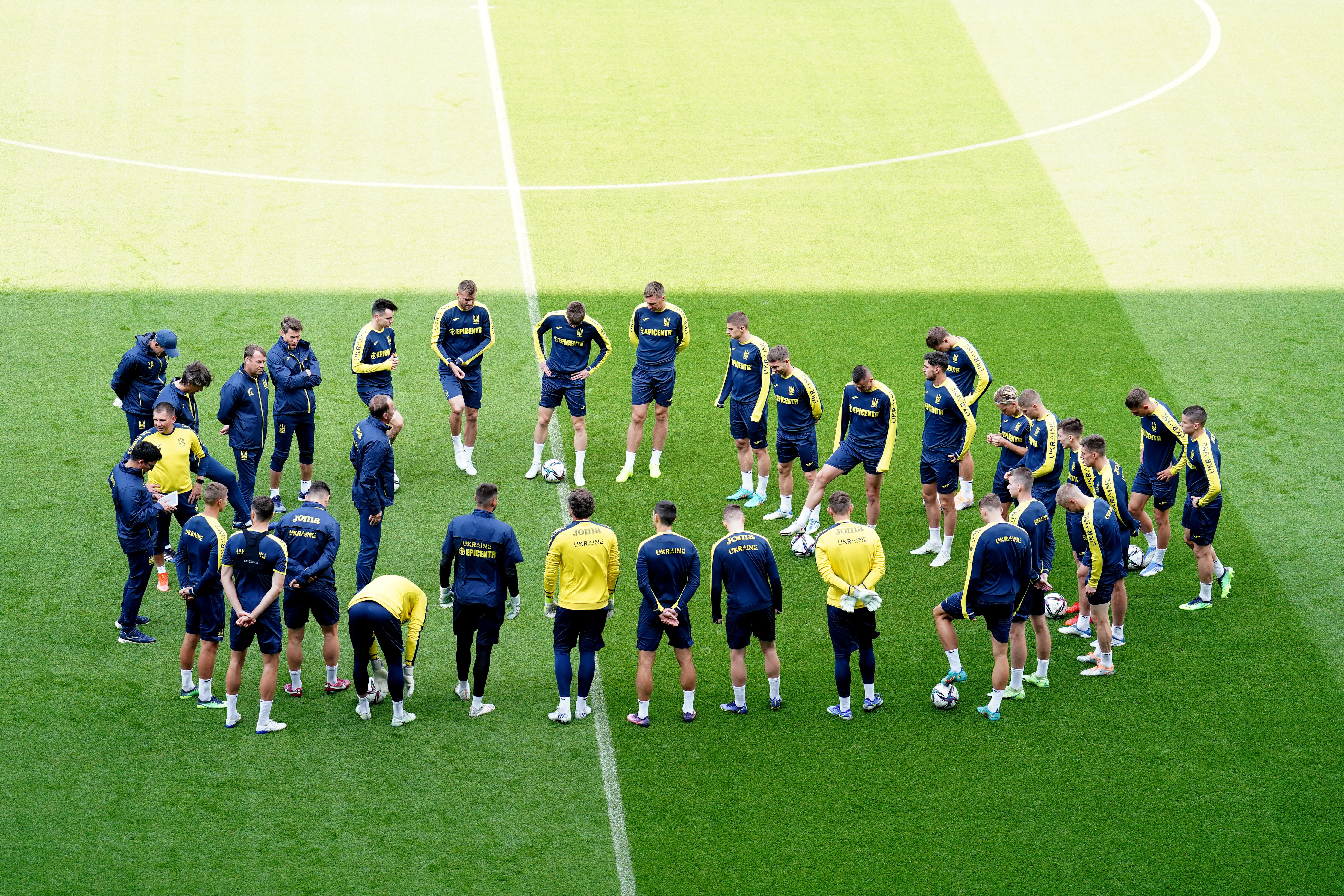 Ukraine players gathered in the centre circle during a training session at the Cardiff City Stadium (Mike Egerton/PA)