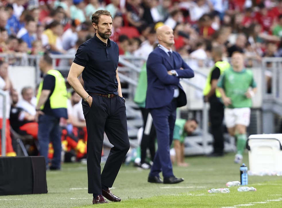 Gareth Southgate’s (left) players were jeered for taking the knee before the match (Trenka Attila/PA)
