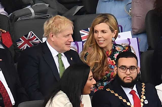 Prime Minister Boris Johnson and his wife Carrie Johnson pictured at the Platinum Party where a joke was made about so-called partygate (Niklas Halle’n/PA)