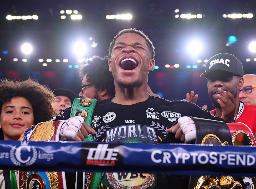 <p>Devin Haney celebrates becoming undisputed lightweight champion against George Kambosos Jr</p>