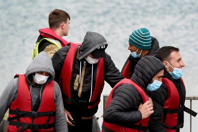 <p>Migrants are still arriving at Dover despite the threat of deportation (Gareth Fuller/PA)</p>
