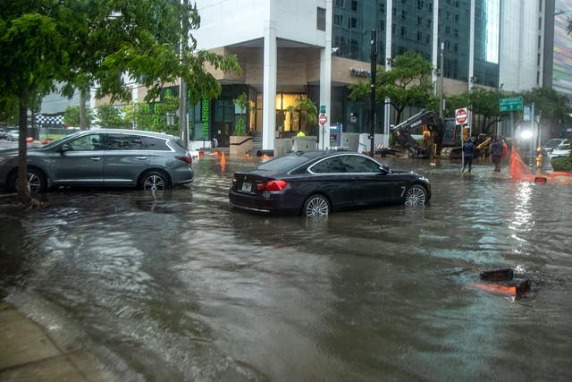 <p>Rainfall from Tropical Storm Alex floods the Brickell area near downtown Miami on 4 June</p>
