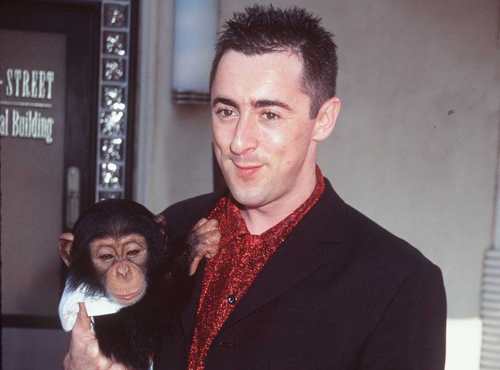 <p>Alan Cumming and Tonka at the 1997 premiere of ‘Buddy'</p>