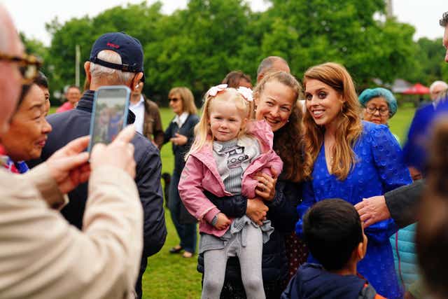 Princess Beatrice posing for photographs with members of the public (Victoria Jones/PA)