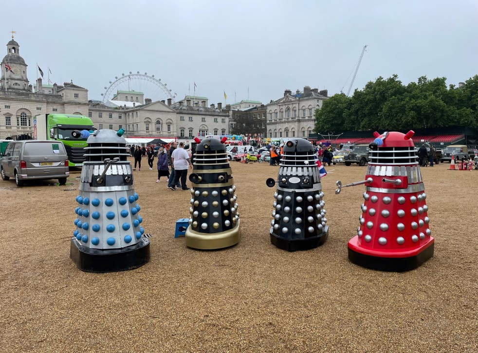 A gang of Daleks, extra-terrestrial mutants known from the Doctor Who television series, prepare to take part in the section of the Jubilee parade celebrating the 1960s at the Platinum Jubilee Pageant (Sophie Wingate/PA)