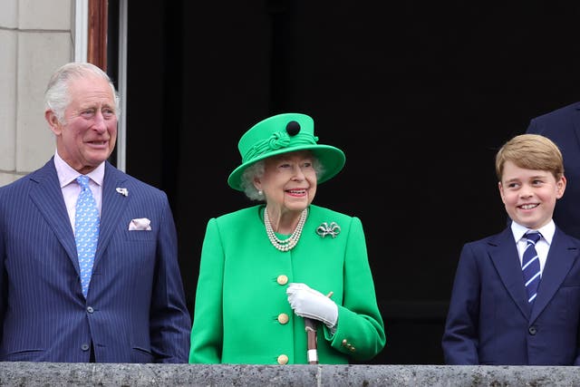 <p>Her Majesty on the Buckingham Palace balcony with  Prince Charles and Prince George</p>
