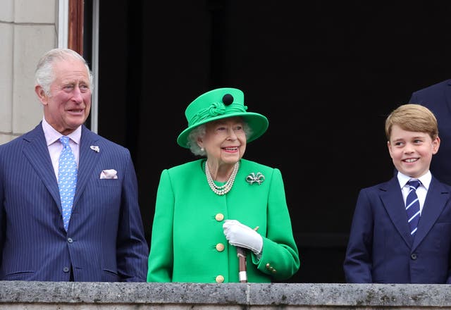 <p>Her Majesty on the Buckingham Palace balcony with  Prince Charles and Prince George</p>