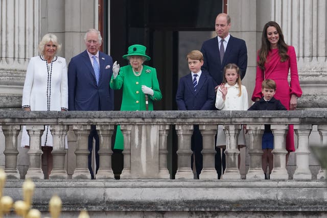The Queen appeared on the Buckingham Palace alongside the Prince of Wales and Duchess of Cornwall and the Cambridges (Jonathan Brady/PA)