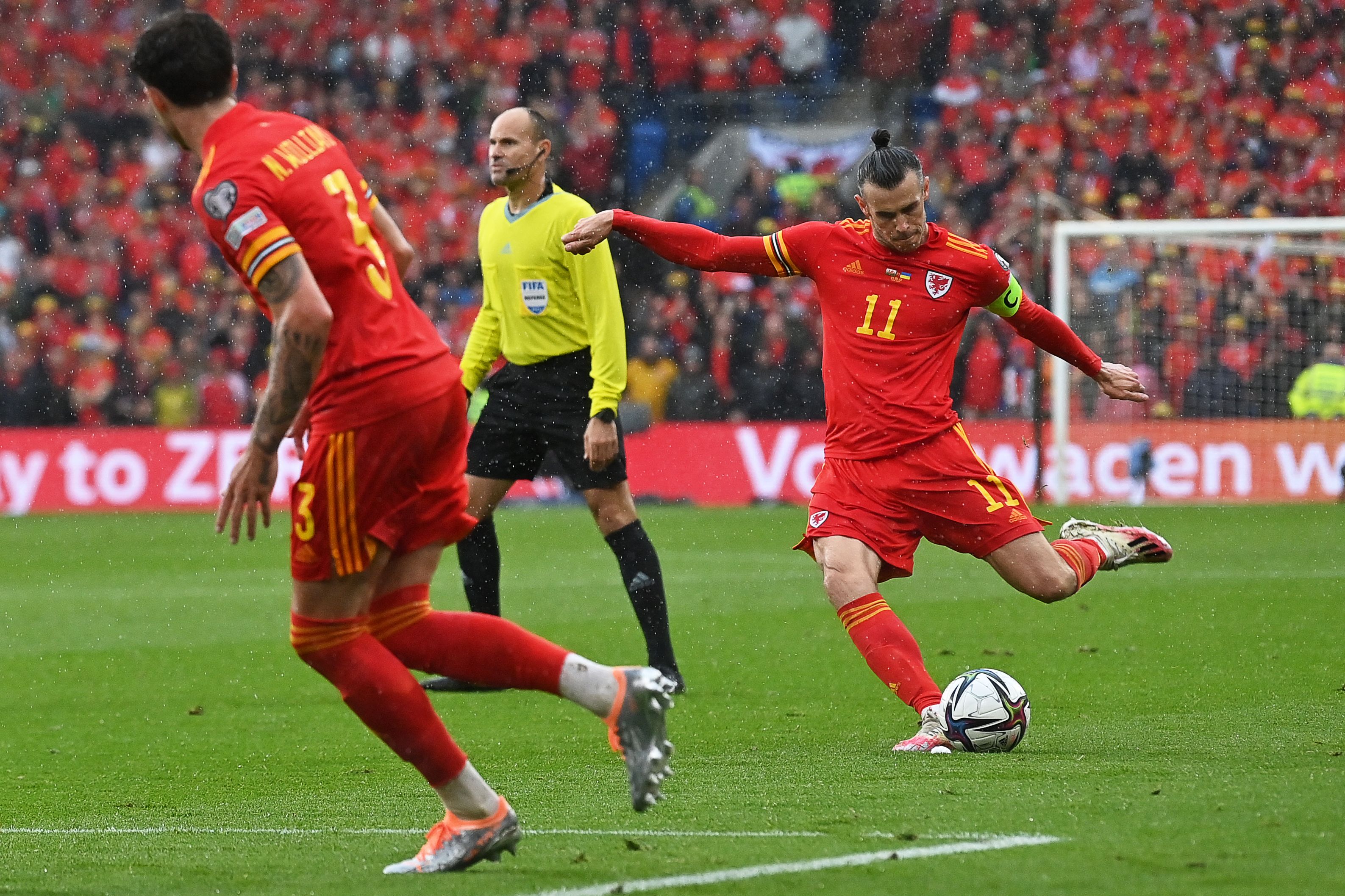 Gareth Bale strikes at goal from a free-kick