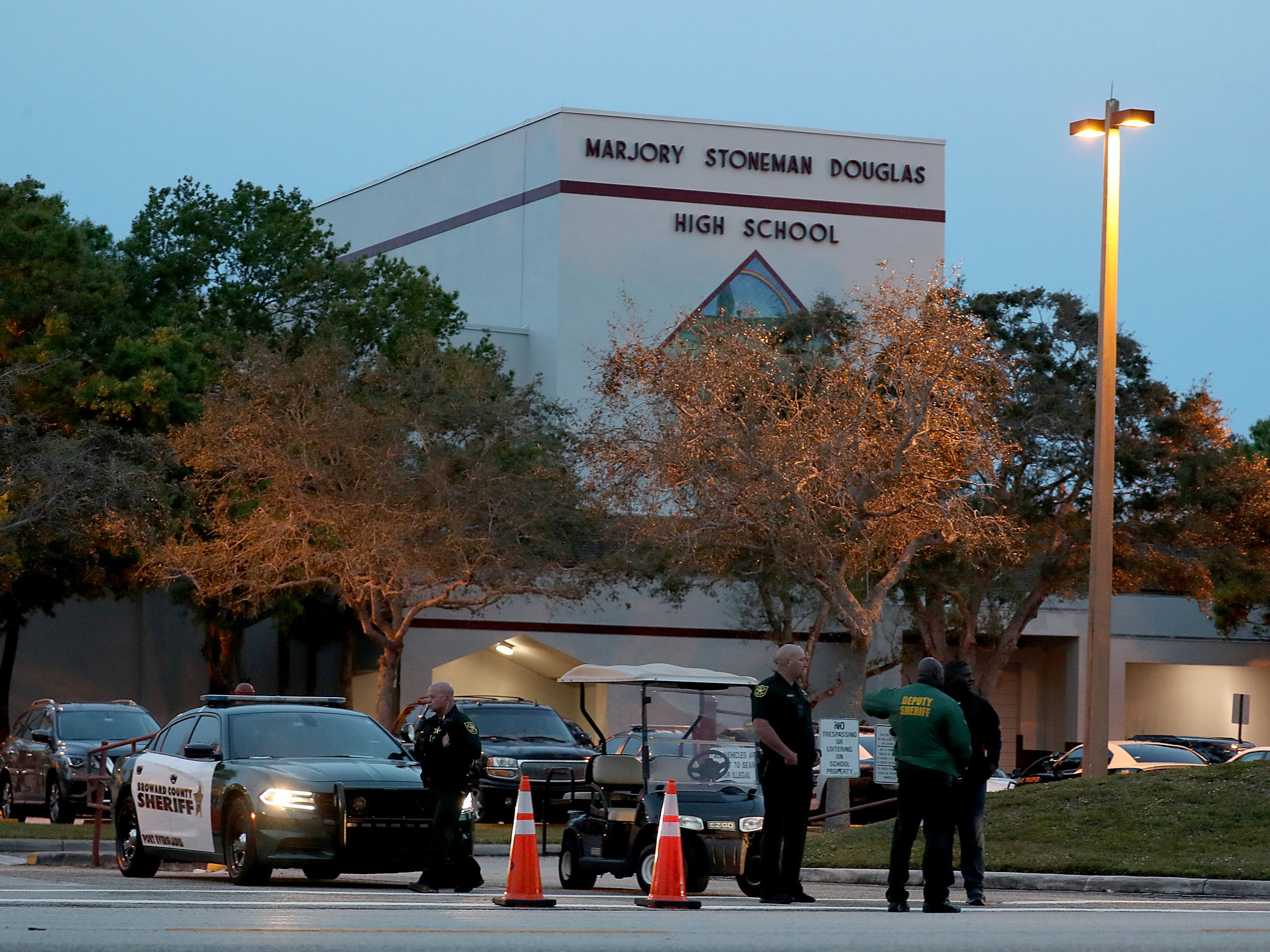 Police officers outside Marjory Stoneman Douglass High School in Parkland, Florida on the one year anniversary of the 2018 mass shooting