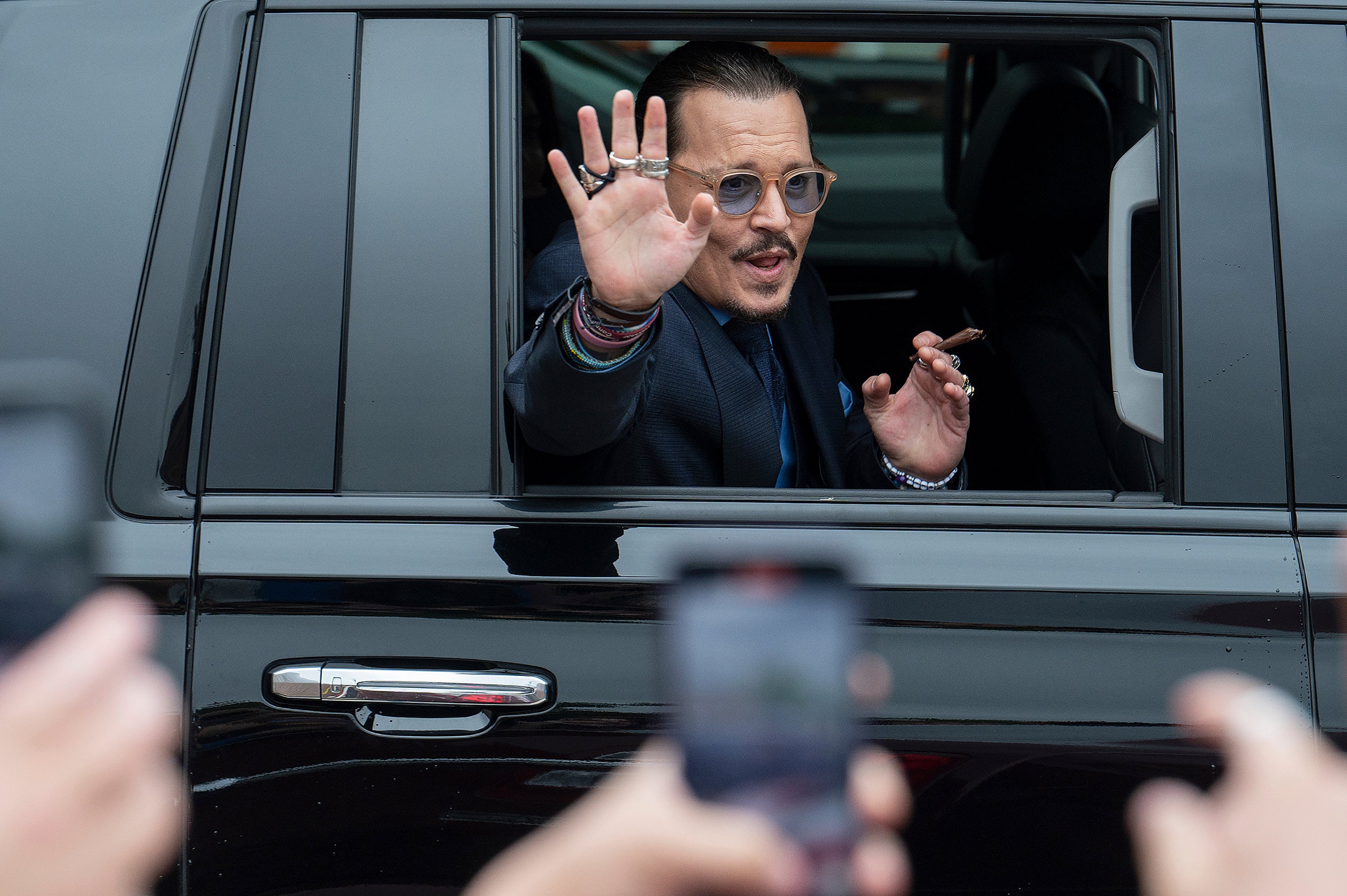 On Wednesday jurors found in favour of Depp who had sued his former partner for defamation over a 2018 op-ed in the Washington Post (Craig Hudson/AP)