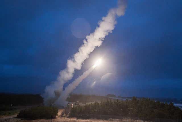 <p>A missile is fired during a joint launch by the US and South Korea on 6 June</p>