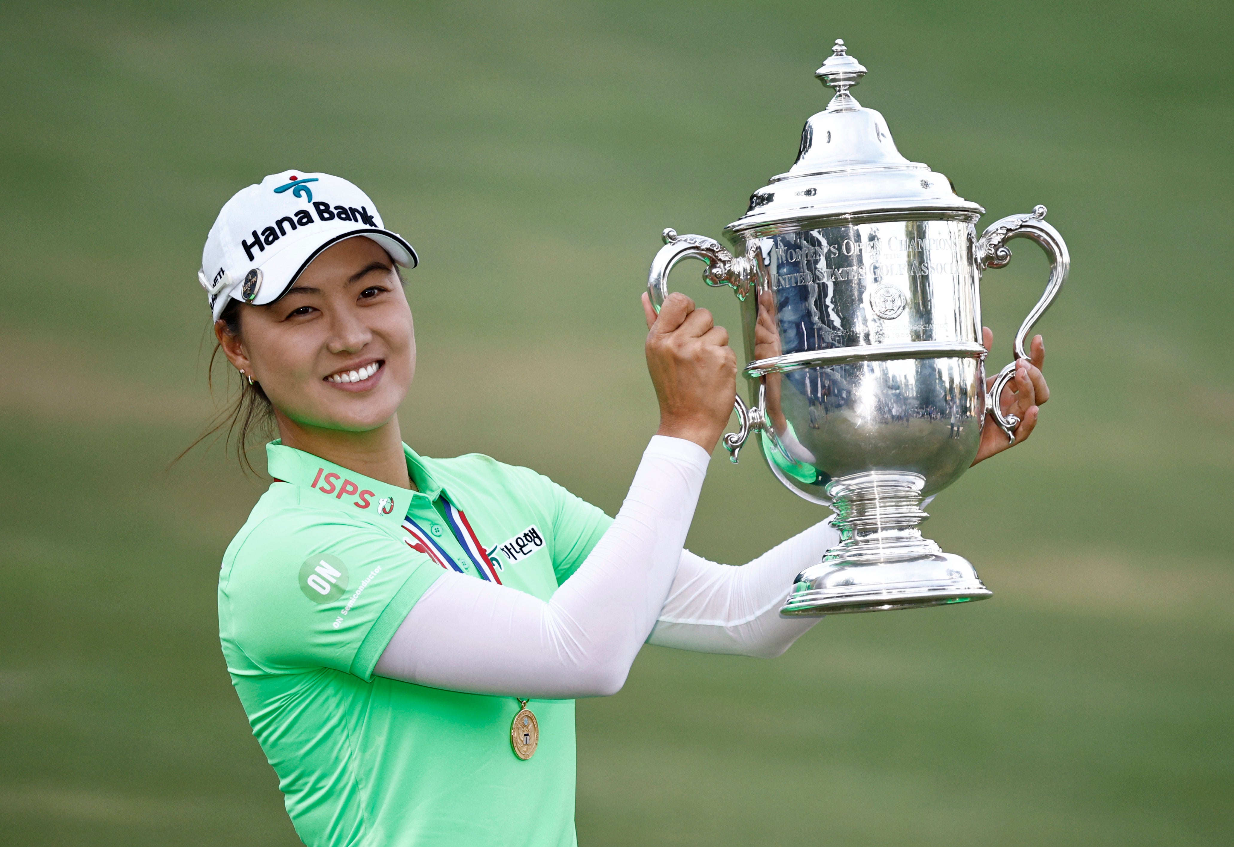 Minjee Lee of Australia poses with the trophy after winning the 77th US Women's Open at Pine Needles, North Carolina, on Sunday