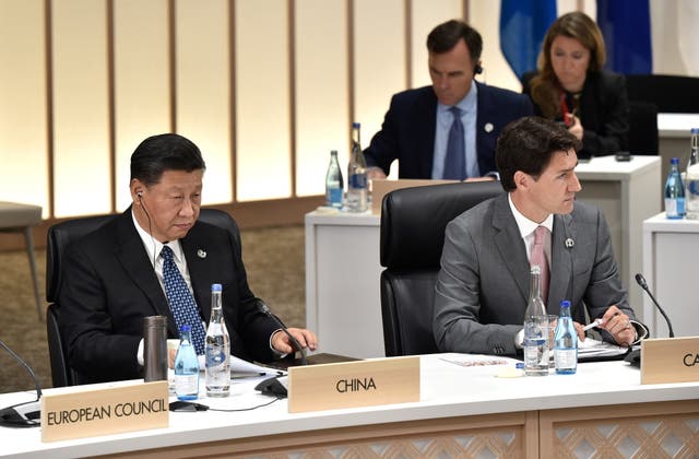 <p>File: China's president Xi Jinping (L) and Canada's prime Minister Justin Trudeau at a G20 summit </p>