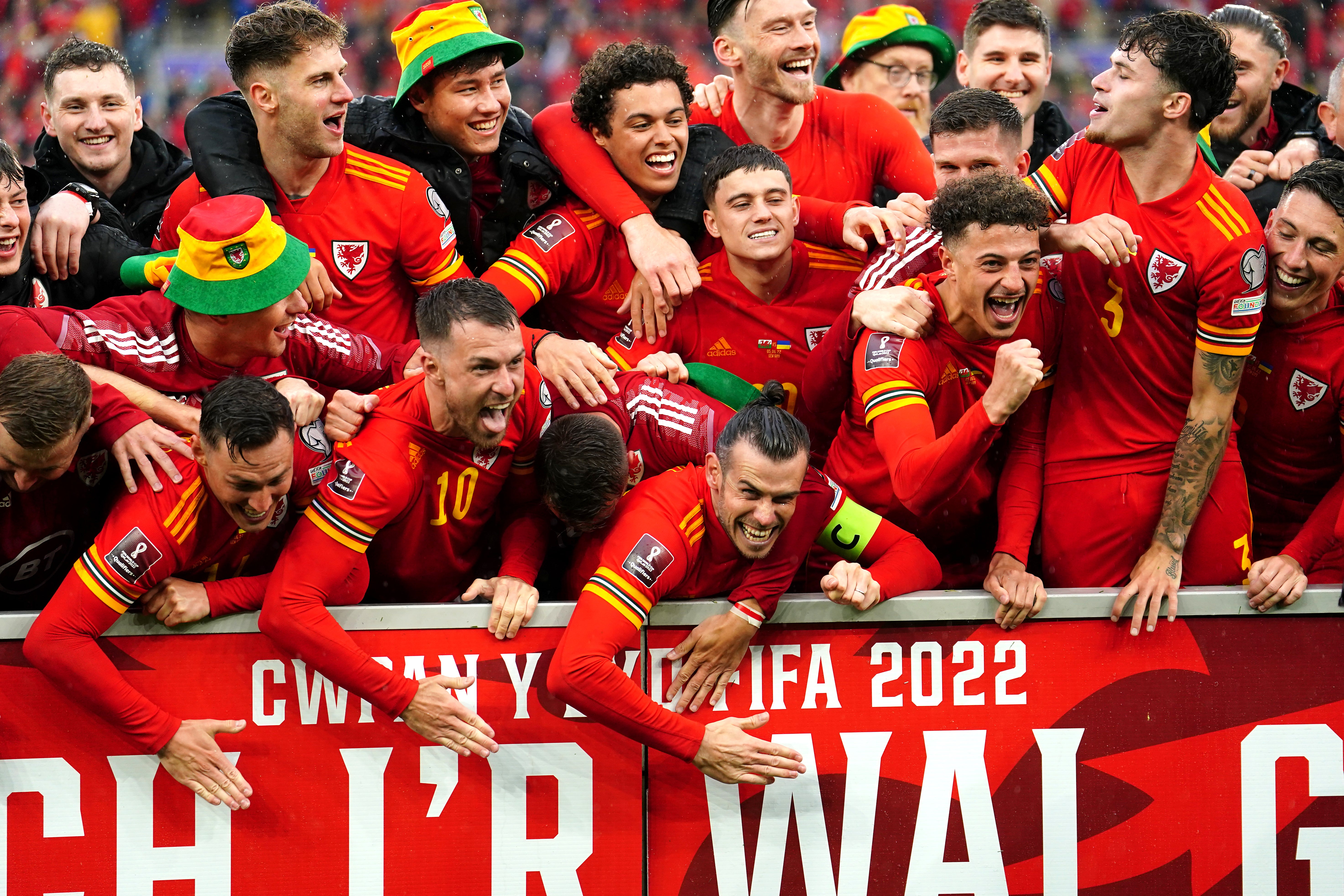Wales celebrate their World Cup qualification (David Davies/PA)