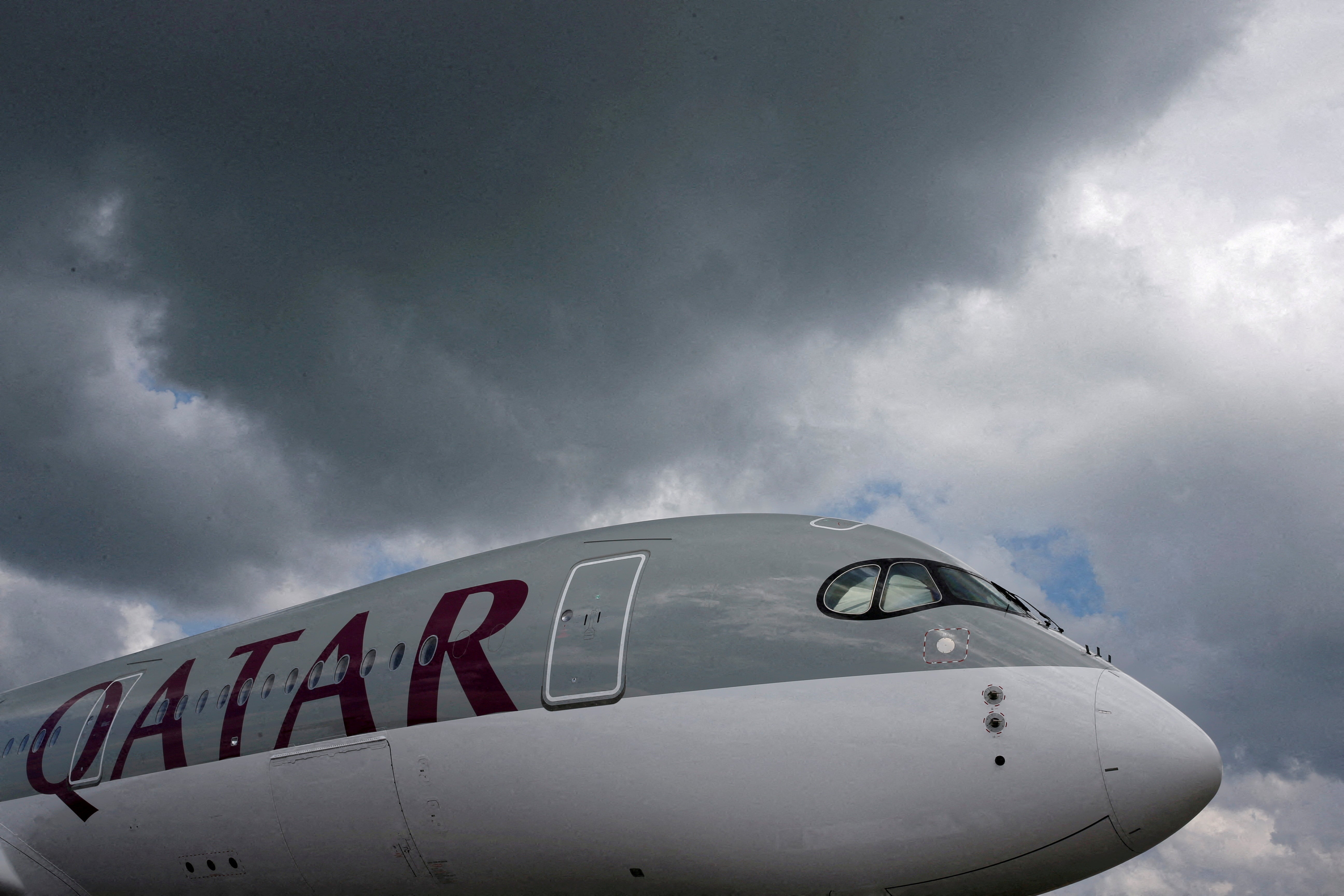 Under a cloud: Qatar’s plans to lay on extra flights for fans has not been welcomed