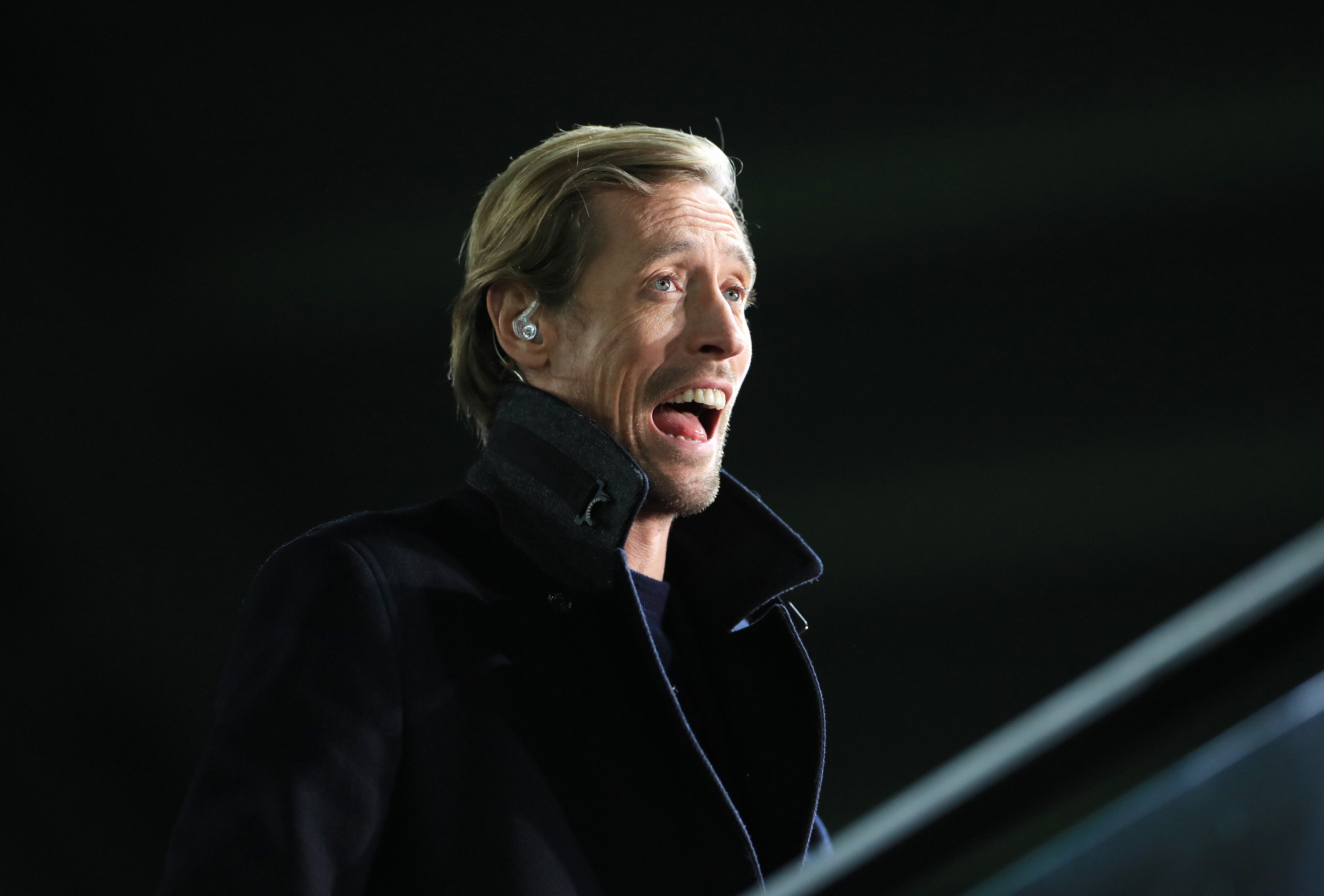 Peter Crouch dressed as a dinosaur (Mike Egerton/PA)