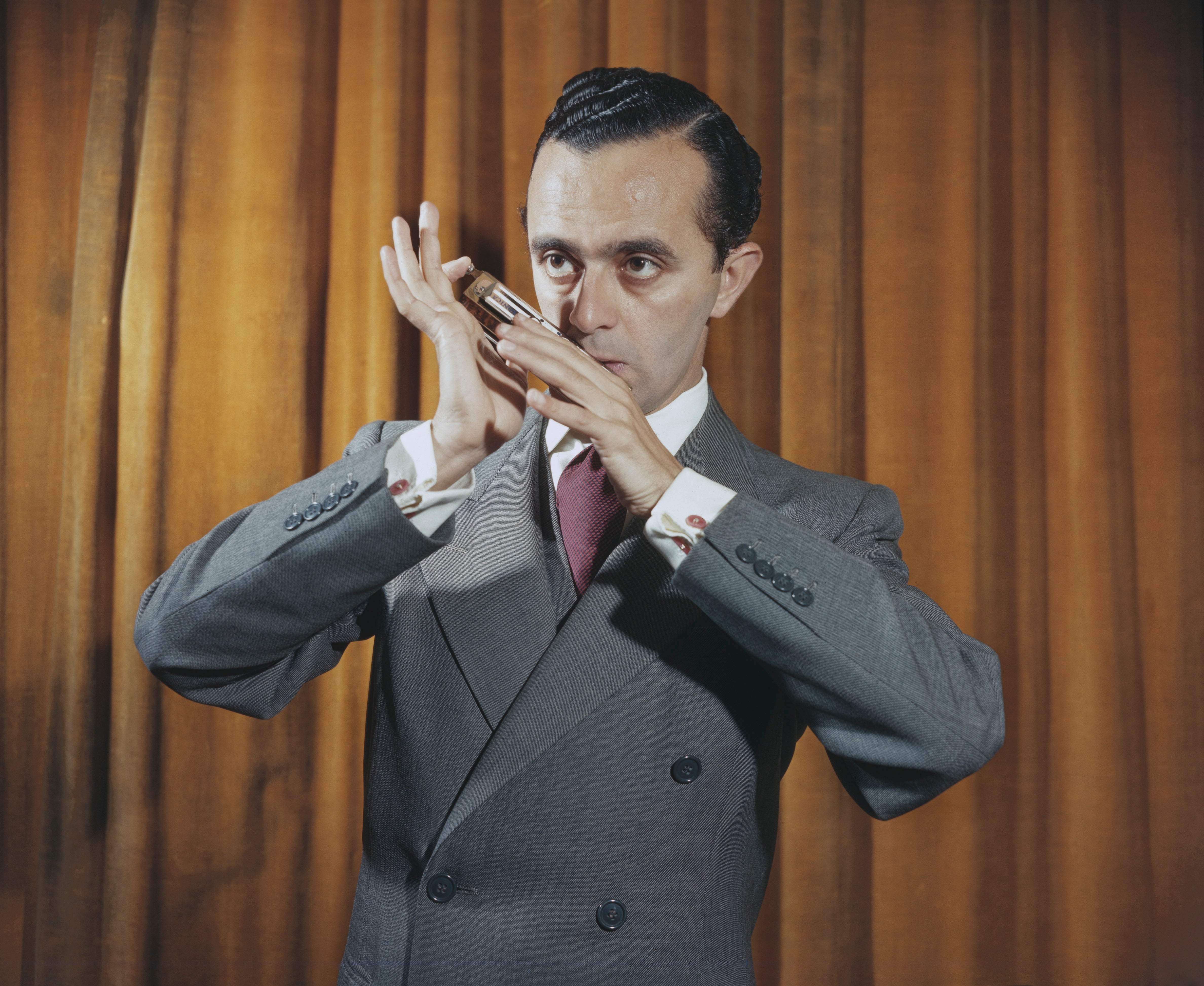Harmonica star Larry Adler performed arrangements of Bartok, Stravinsky, Ravel and Mozart