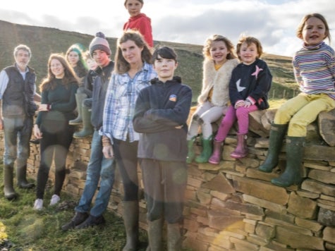 ‘Our yorkshire Farm’s Amanda Owen surrounded by husband Clive and thewir nine children