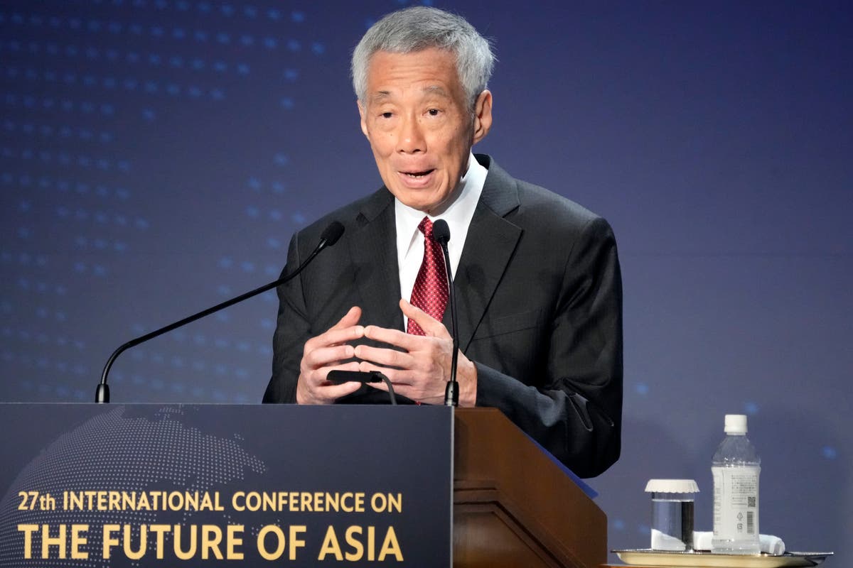 Singapore prime minister promotes likely successor to deputy